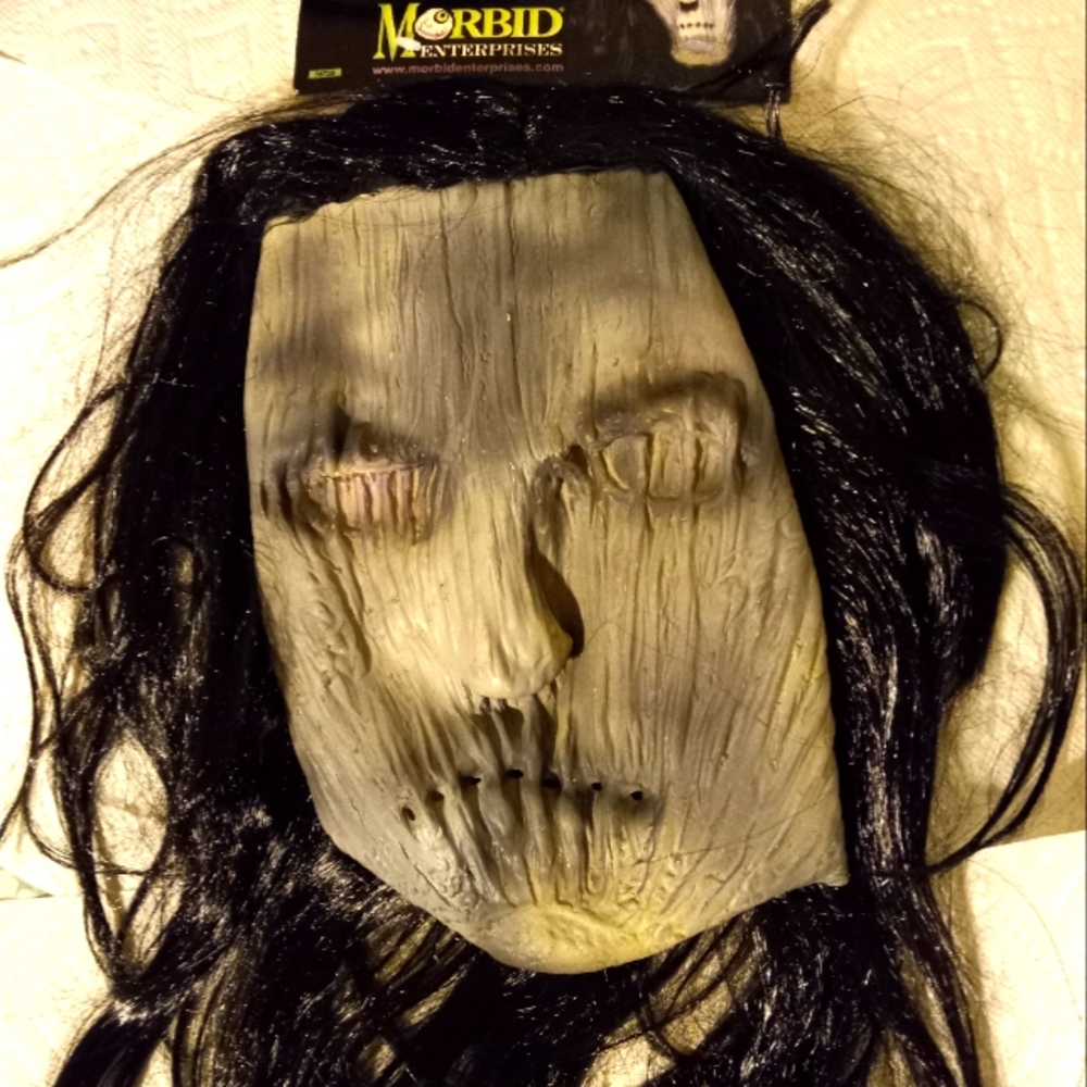 Grotesque mask with hair